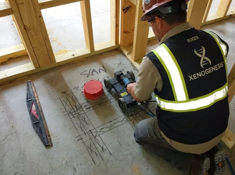 GPR technician performing non-disruptive concrete scan in a Jacksonville healthcare facility